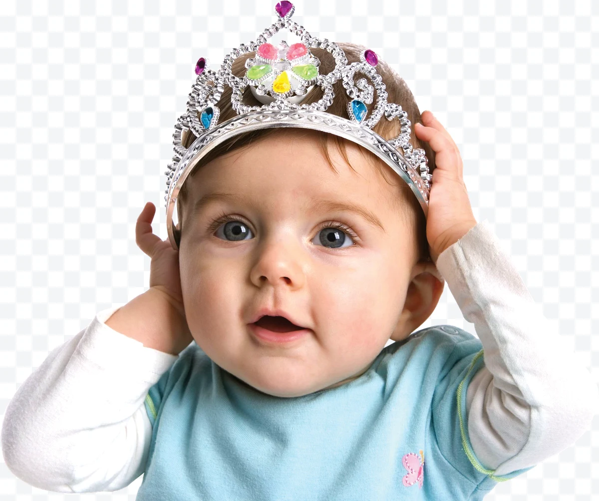 Baby with silver crown decorated with colorful stones, blue shirt and sleeves