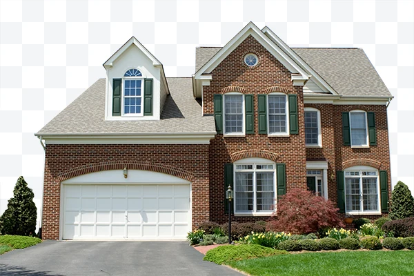 Brick residential house with green shutters and white garage