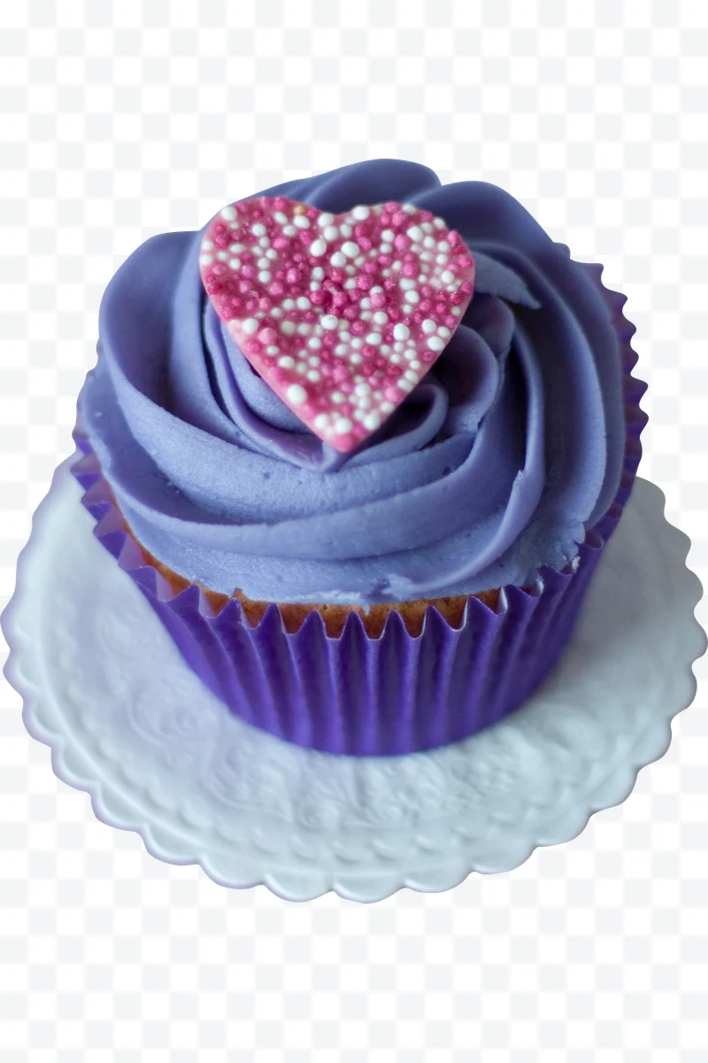 Cupcake with purple frosting and decorative heart