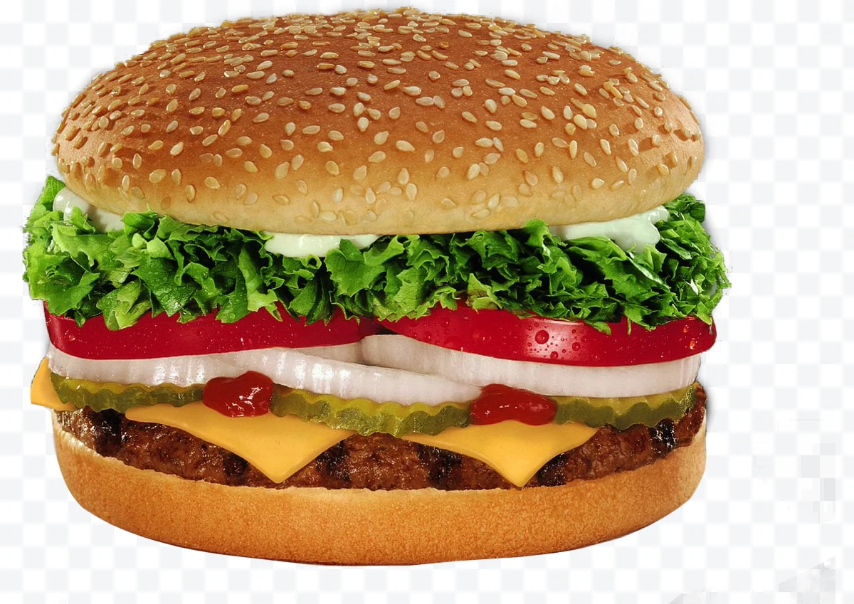 Cheeseburger with sesame seed bun, lettuce, tomato, onion, and pickles