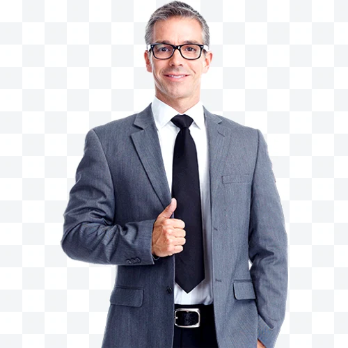 Businessman with black glasses, gray suit, and black tie giving a thumbs up