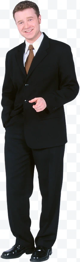 Man in black suit, brown tie, and white shirt pointing forward