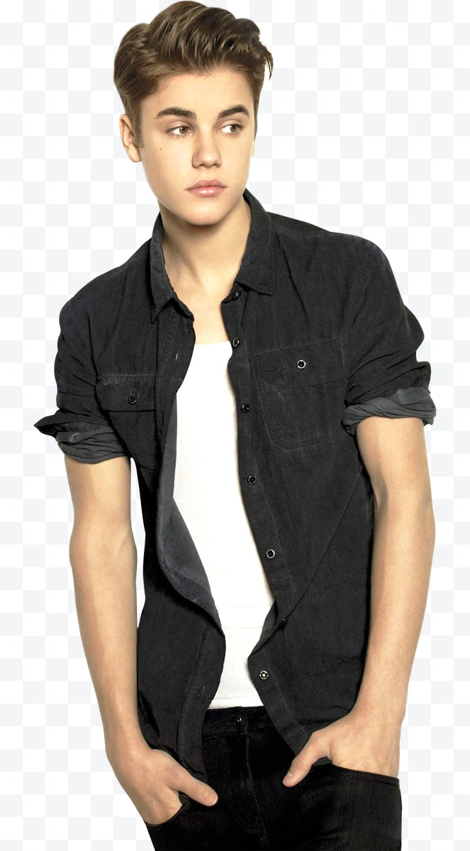 Justin Bieber wearing a rolled-up black shirt and white T-shirt looking towards