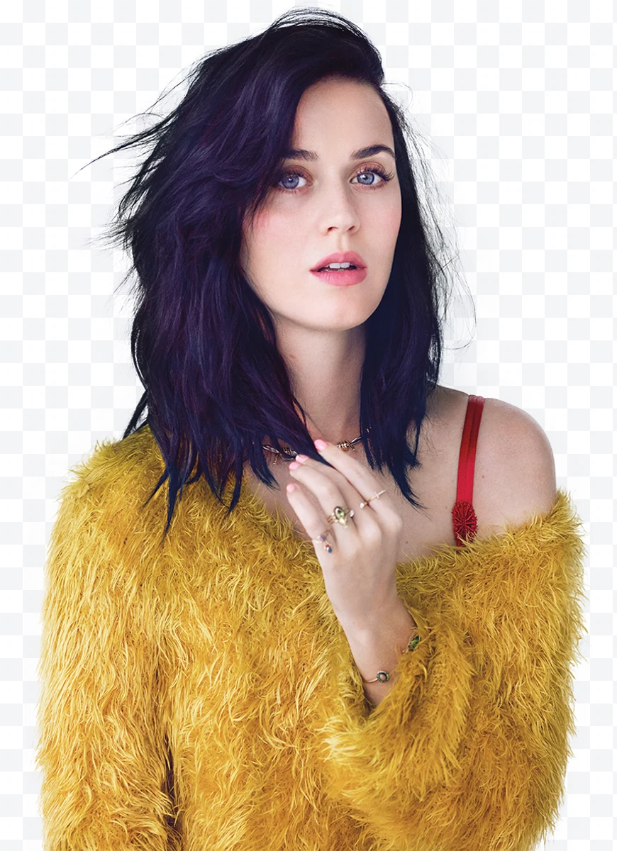 Katy Perry with fuzzy yellow sweater and dark hair looking forward