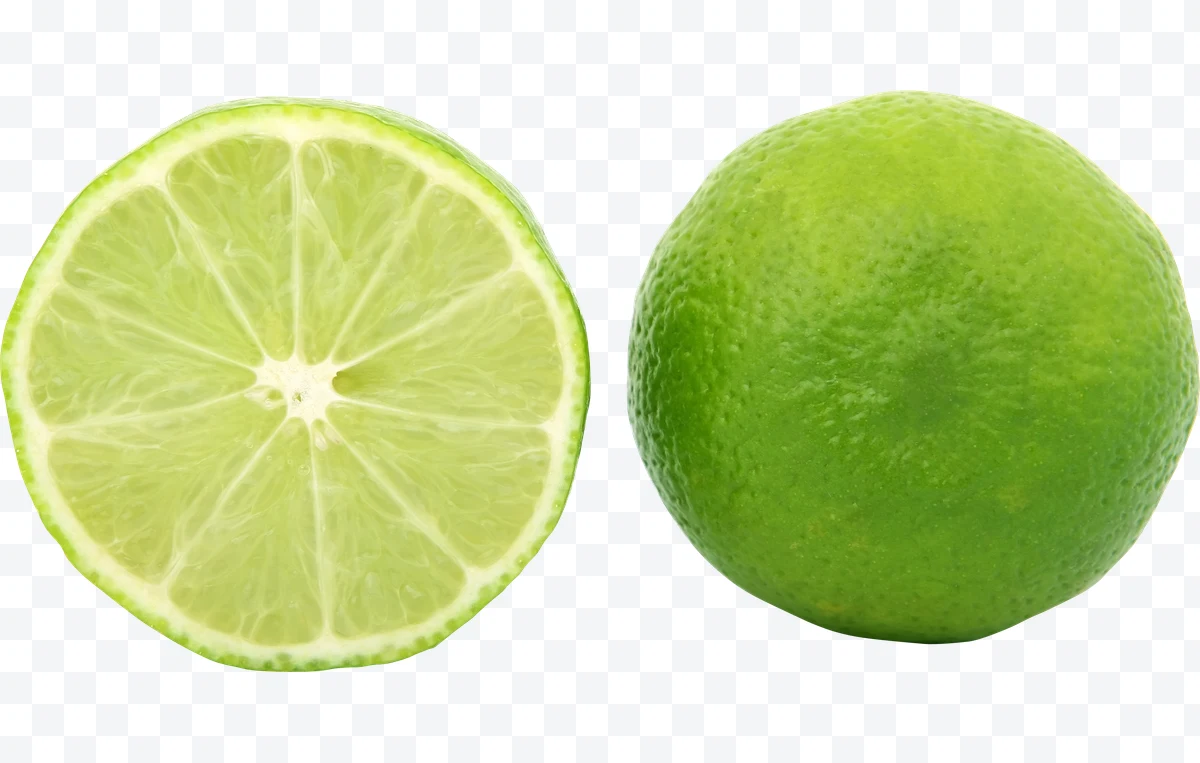 Whole green lime and a half lime cut to show the inside.