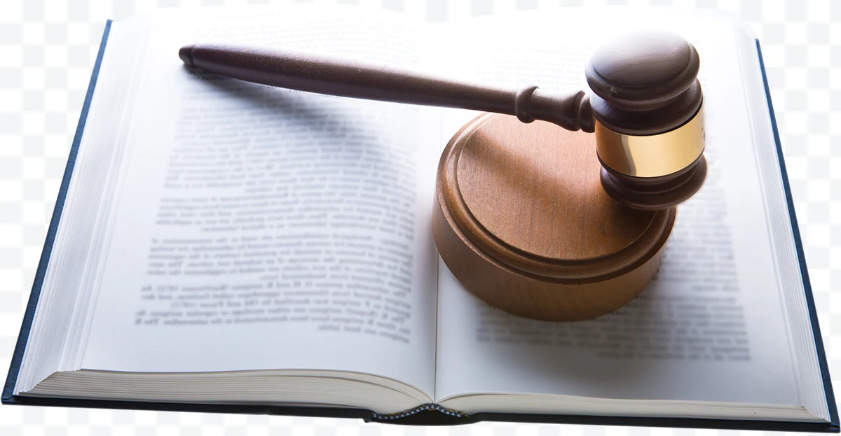 Judge's gavel on open book