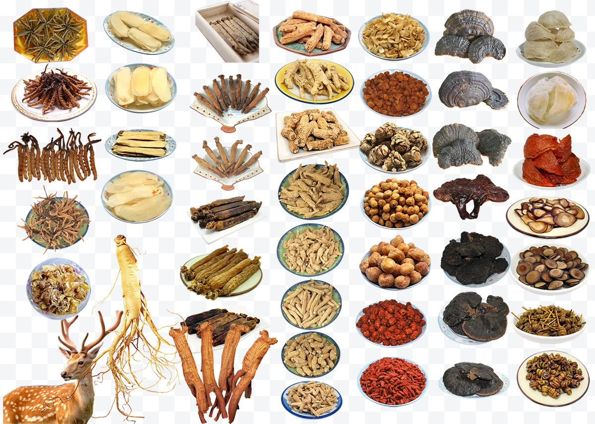 Collection of assorted traditional Chinese medicines on plates and boxes.