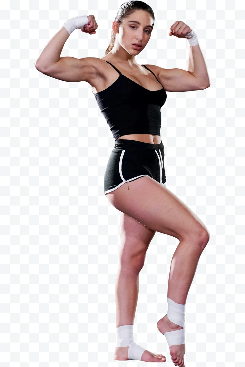 Athletic woman in black sportswear with flexed arms against a white background.
