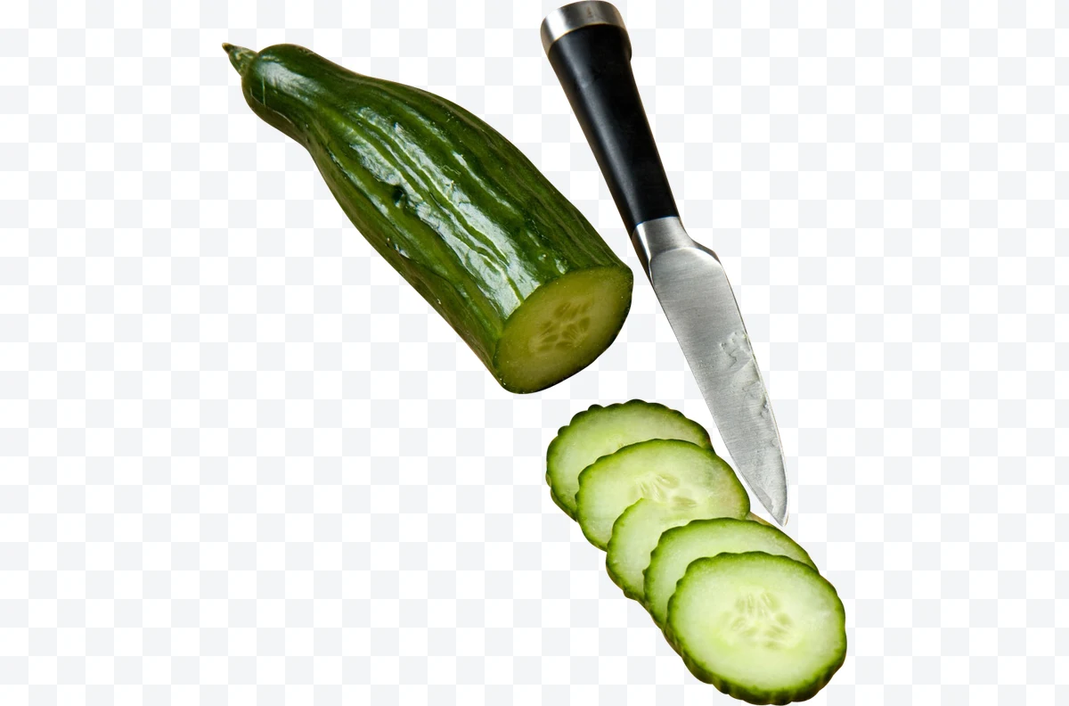 Cucumber sliced with knife