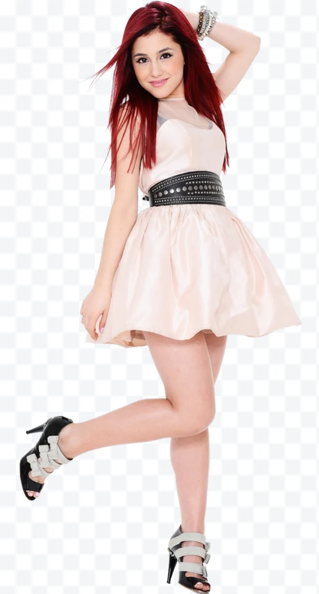 Woman with pink dress and red hair posing with one leg raised