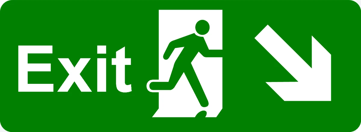 Green emergency exit sign with running person and downward arrow