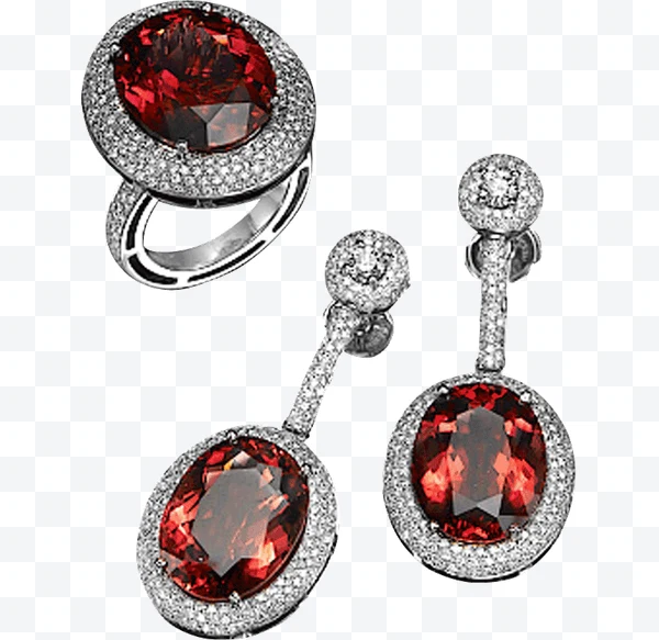 Conjunto de joyería con anillo y pendientes con piedras rojas y diamantes