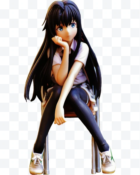 Anime figure sitting on chair