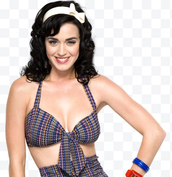 Katy Perry con cabello rizado negro, diadema blanca con lazo y top de bikini a