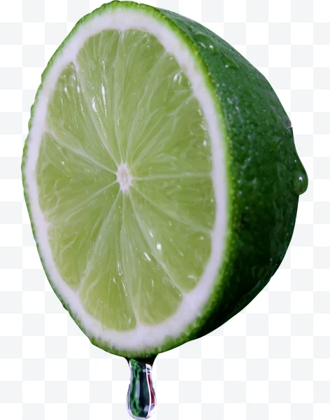 Mitad de lima verde con una gota de jugo cayendo