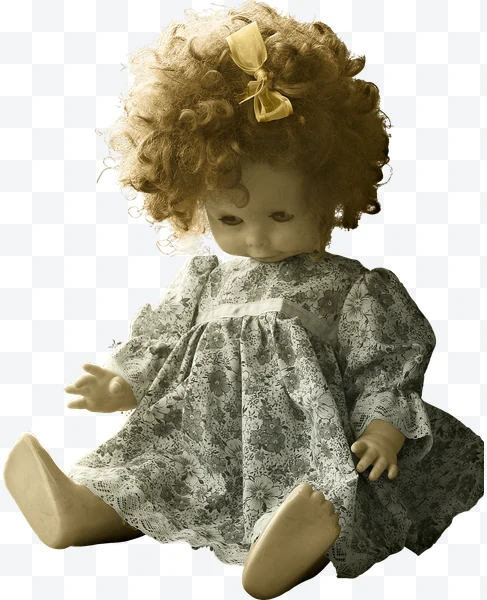 Muñeca de trapo con vestido floral y lazo amarillo