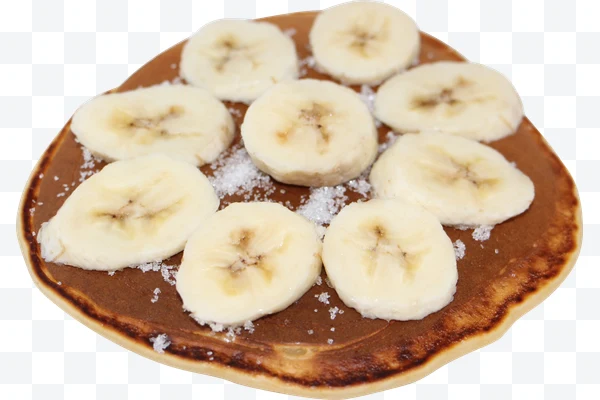 Panqueque con rodajas de plátano y azúcar espolvoreada